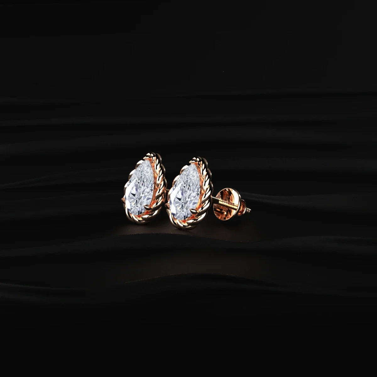 Pear Cut Diamond Stud Earrings with Twisted Rope Frame