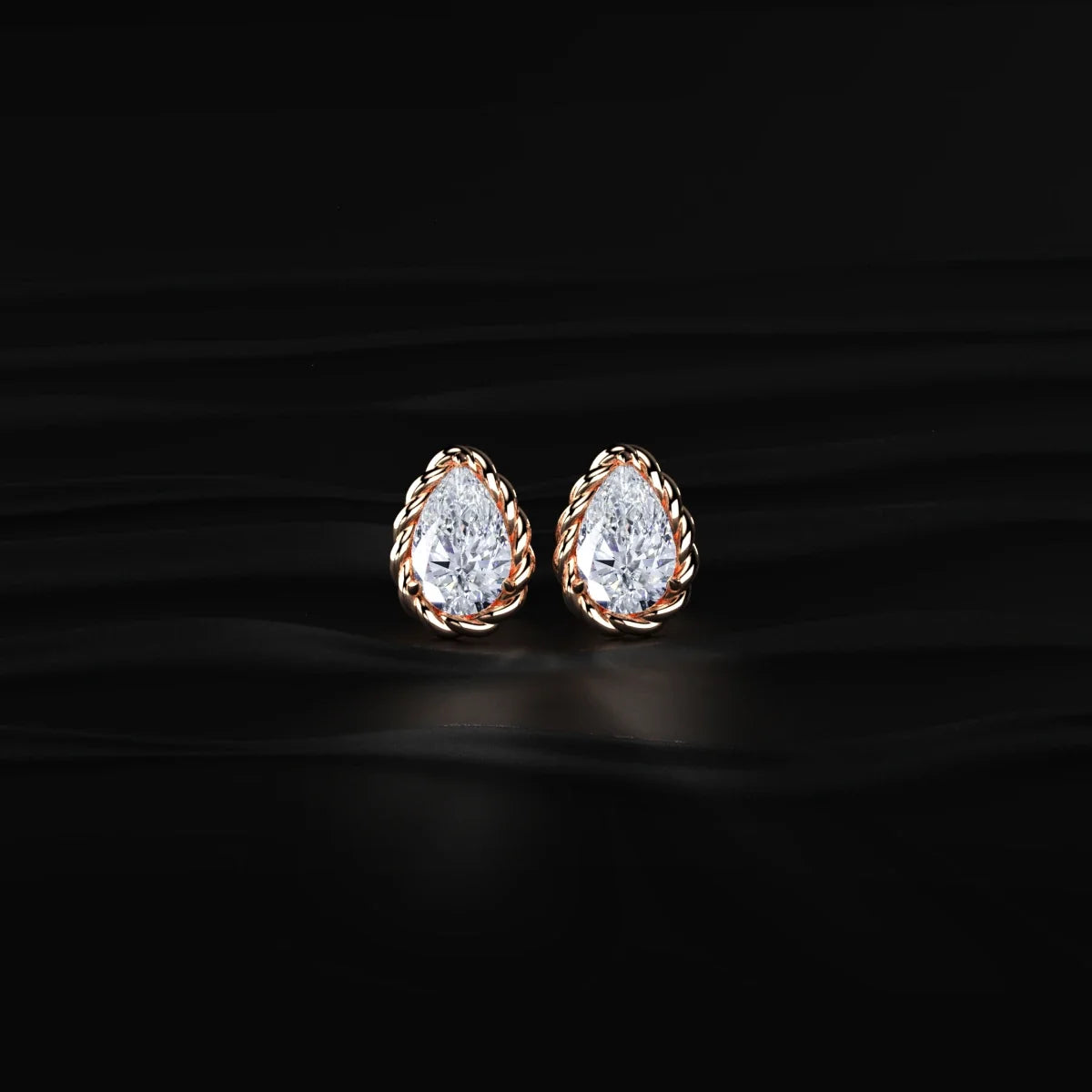 Pear Cut Diamond Stud Earrings with Twisted Rope Frame