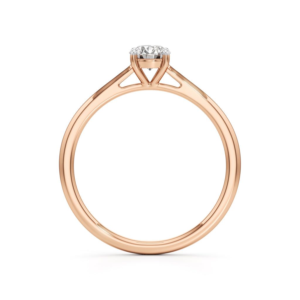 Solienara four prong round cut solitaire ring