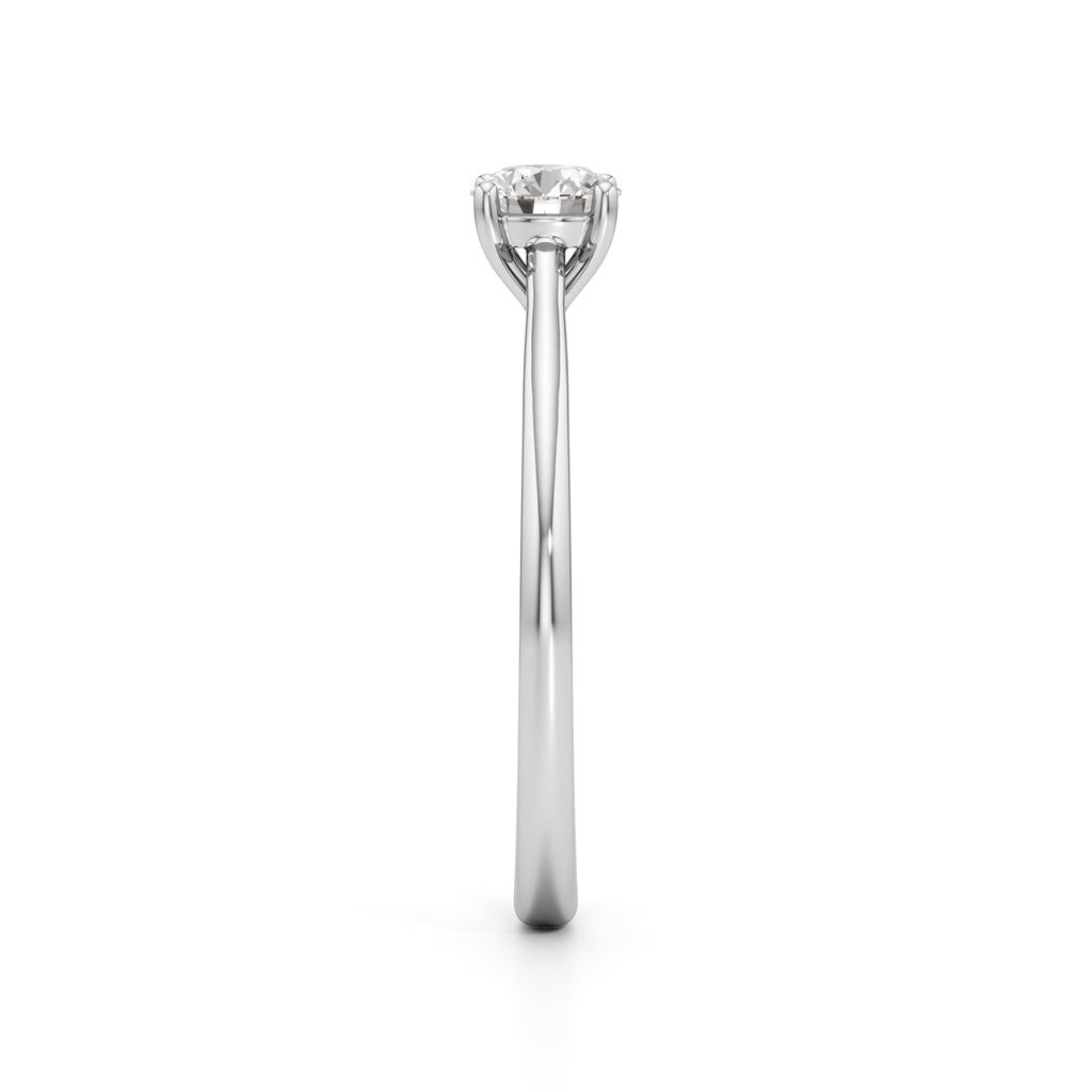 Solienara four prong round cut solitaire ring