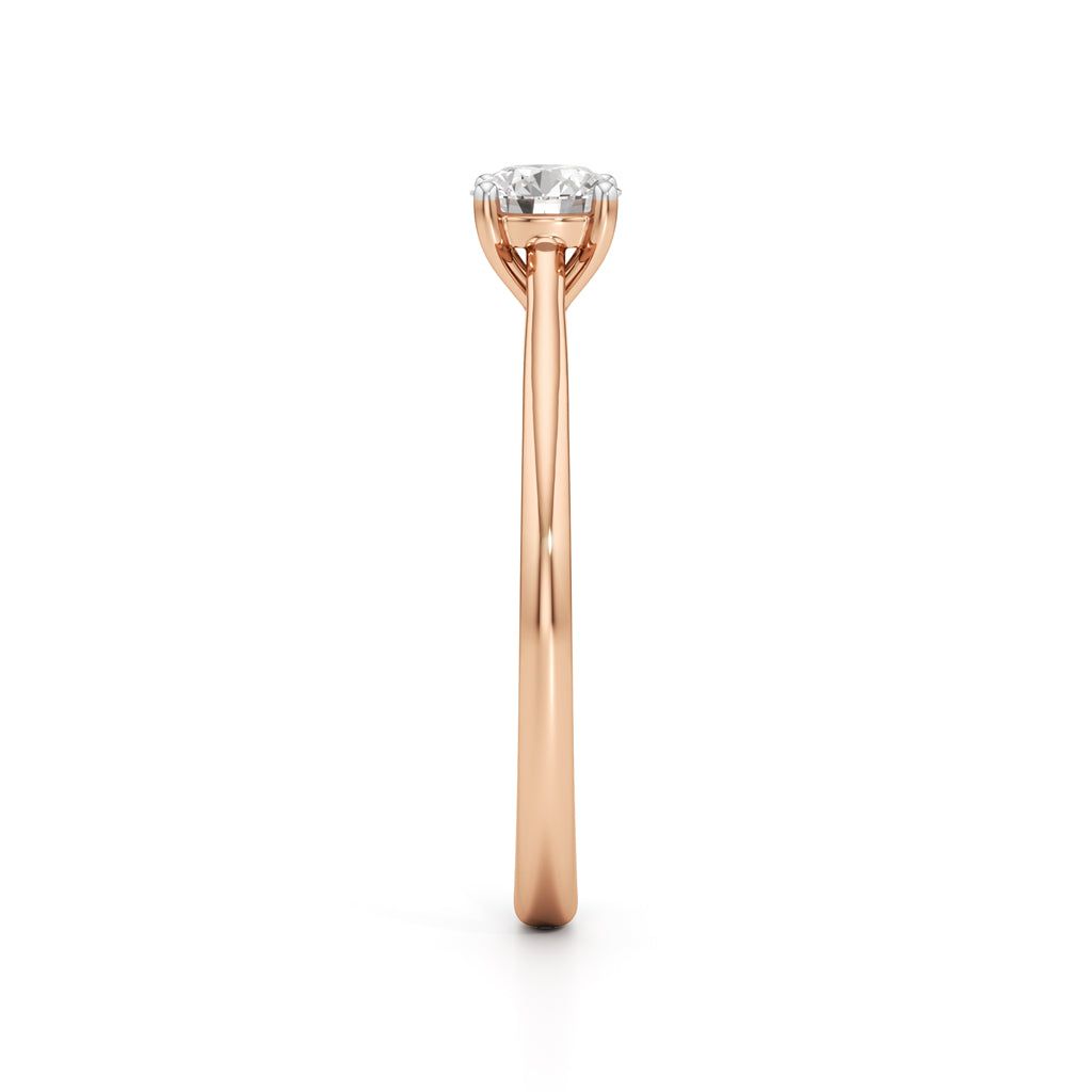 Solienara four prong round cut solitaire ring